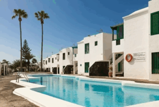 San Fermín holiday apartment pool animation in Puerto del Carmen, Lanzarote