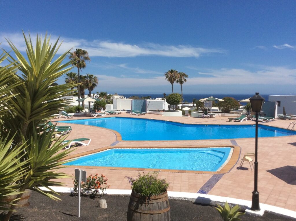 Loma Verde holiday apartment with sea and pool views in Puerto del Carmen, Lanzarote