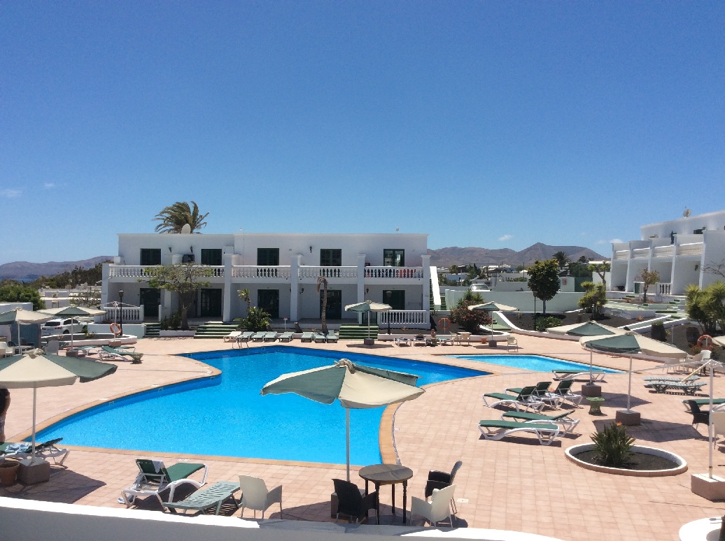 Shared pool area at Loma Verde apartment in Puerto del Carmen, Lanzarote